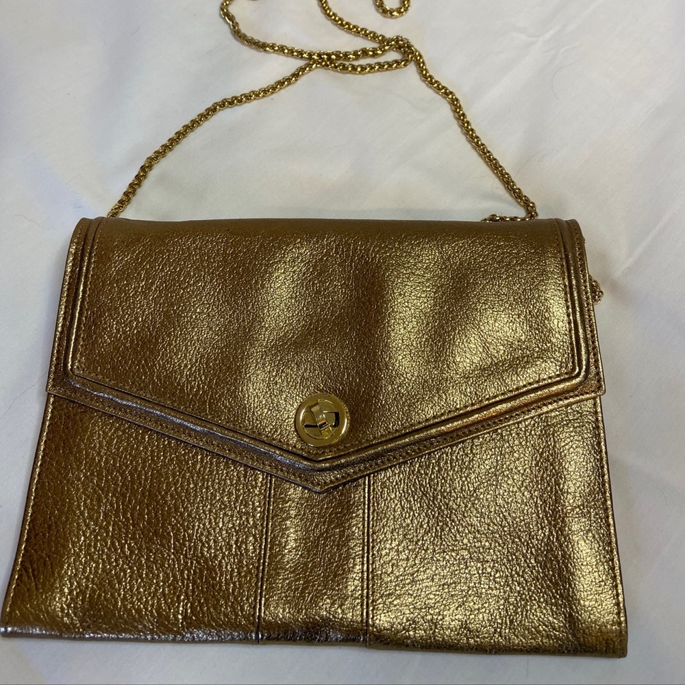 Tusk gold metallic handbag with chain strap